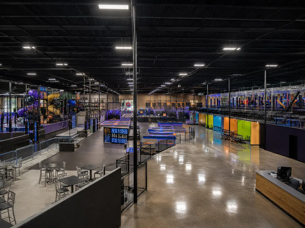 Large family entertainment center with contained play, trampoline, ninja, slides and multiple operational zones